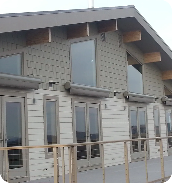 Modern building with large windows and doors.