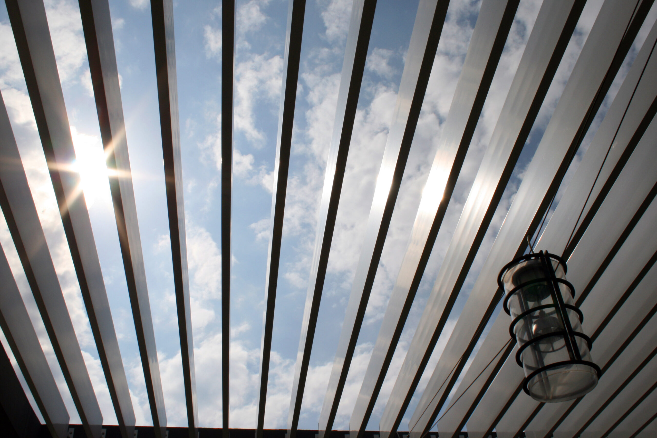 Pergola and lamp